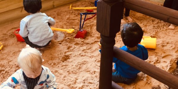 Children playing in giant sandpit