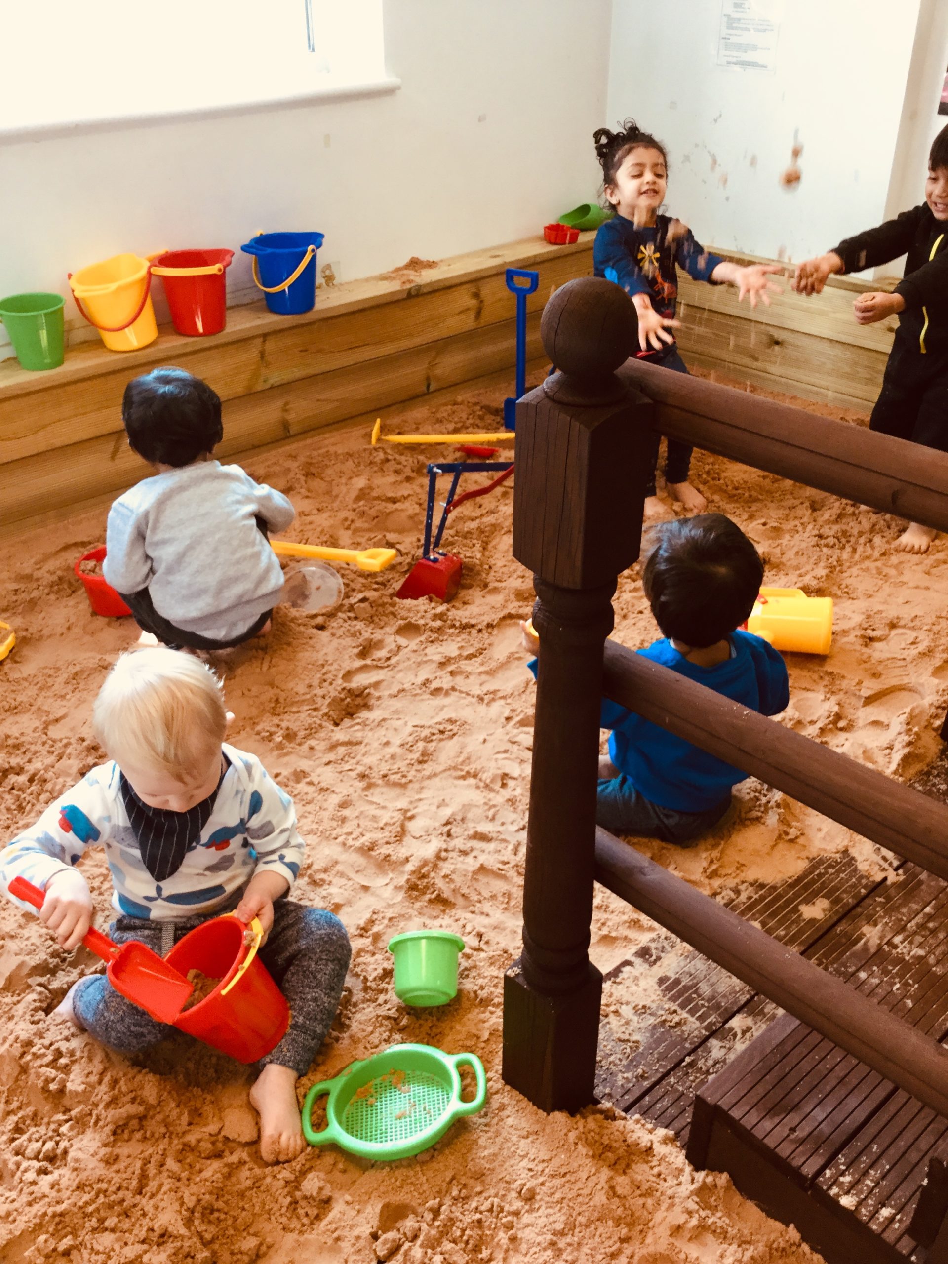 Children playing in giant sandpit